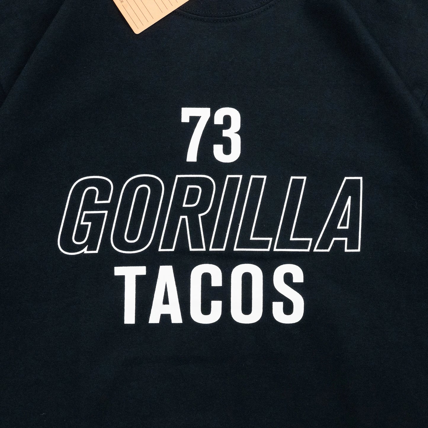 GORILLA TACOS(ゴリラタコス)のフロントに大きくデザインがプリントされたTシャツ「73 GT TEE」のブラックカラーのフロントデザインの詳細写真