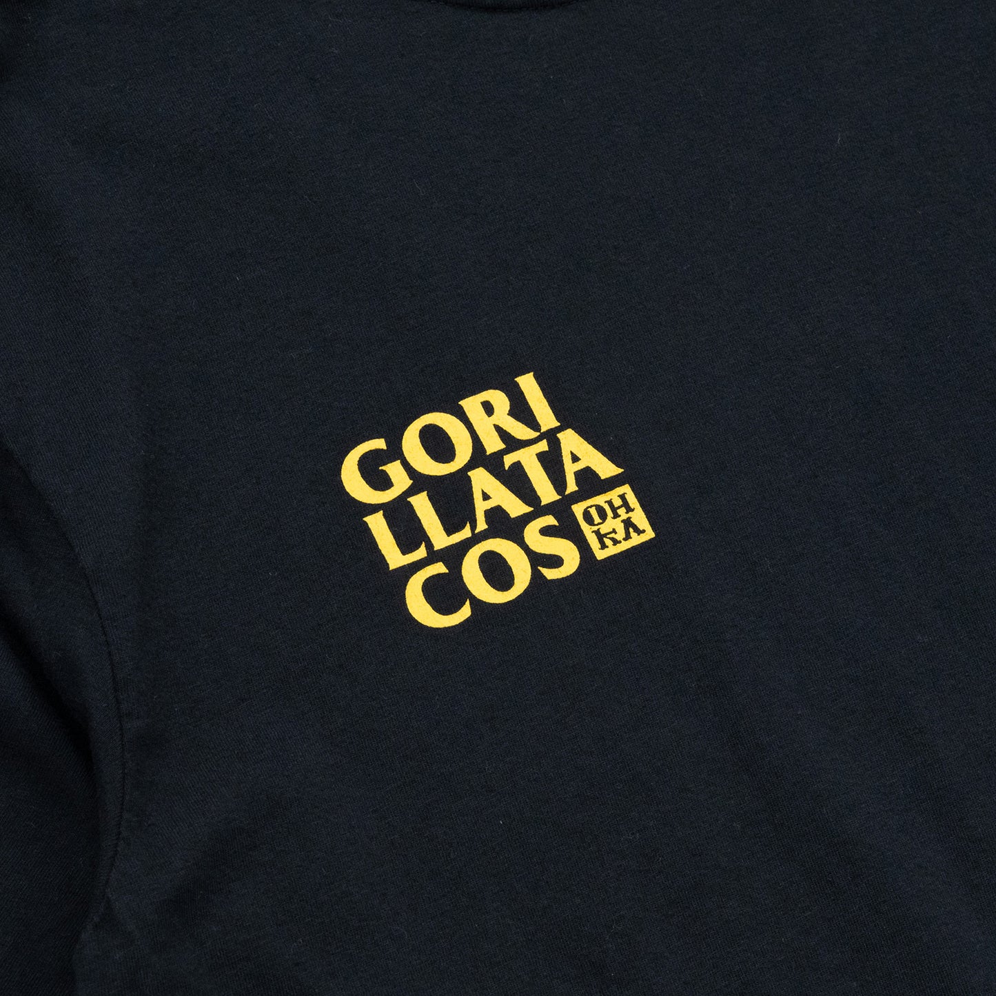 中目黒の人気餃子店「OHKA THE BESTDAYS」とのコラボレーションモデルのGORILLA TACOSのTシャツ「OHKA TEE」のBLACKカラーのフロントデザインの近接写真