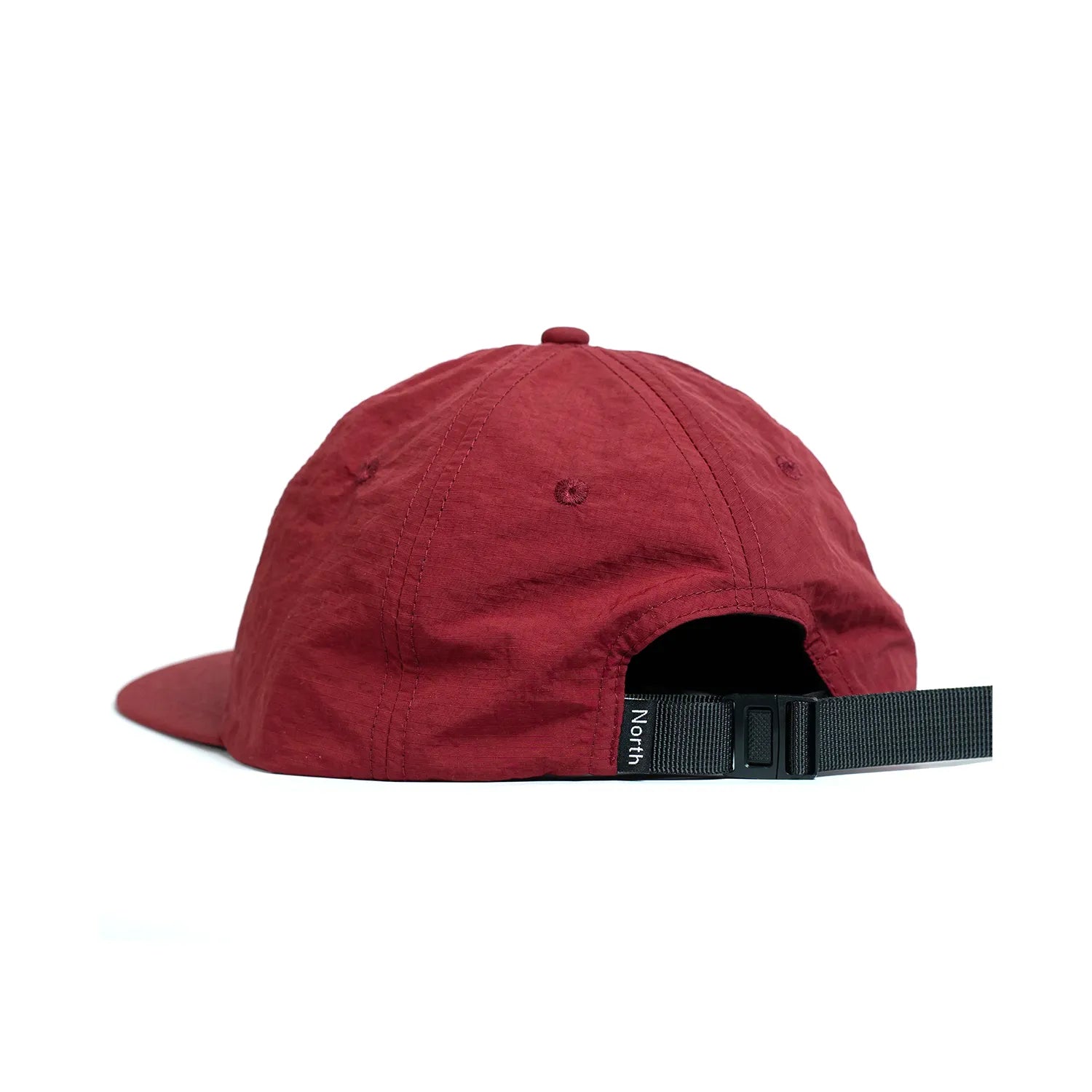 NORTH SKATE MAG(ノーススケートマグ)のリップストップナイロン性の6パネルキャップ「ZODIAC RIPSTOP CAP」のBURGUNDYカラーの背面からの写真