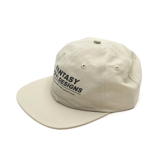 SCI-FI FANTASYのフロントにデザインがプリントされたナイロン製キャップ「EXTREME DESIGN HAT」のTANカラーの斜め左手前からの商品写真