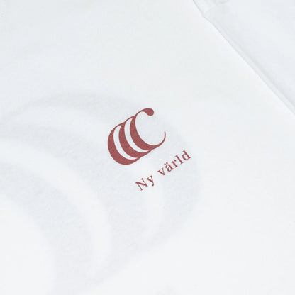 clumsy. Pictures(クラムジー)のCCCロゴが背面に大きくプリントされた定番アイテム「LIMITED CCC」ロングスリーブのWHITE/ROUGEカラーのフロント左胸のデザインの写真
