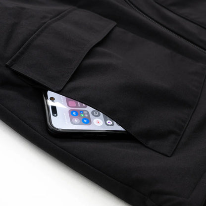 ナイロンダック生地を使用したclumsy(クラムジー)の中綿入りタクティカルベスト「TACTICAL DUCK VEST」のBLACKカラーのサイドポケットの写真