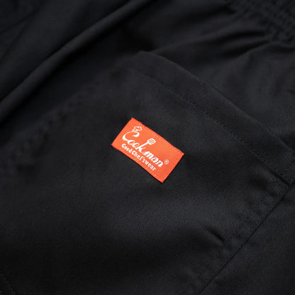COOKMAN(クックマン)を代表するワイドパンツ「WIDE PANTS」のBLACKカラーのバックポケットのブランドタグの写真