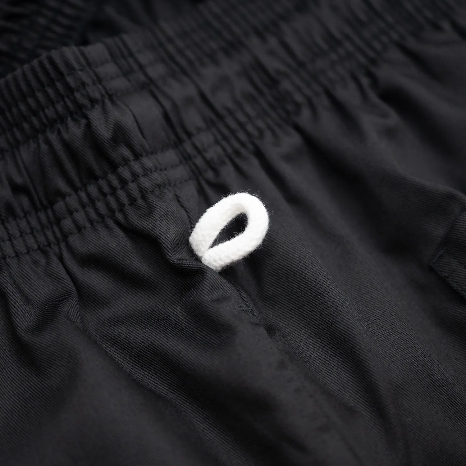 COOKMAN(クックマン)を代表するワイドパンツ「WIDE PANTS」のBLACKカラーのストラップ写真