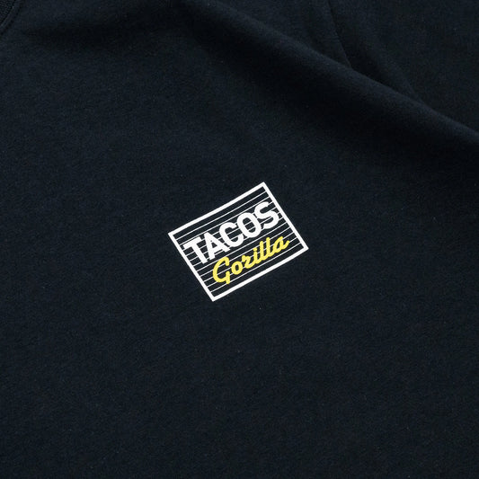 GORILLA TACOS(ゴリラタコス)のフロント左胸にデザインがプリントされたTシャツ「TACOS 2 TEE」のブラックカラーのフロントデザインの詳細写真