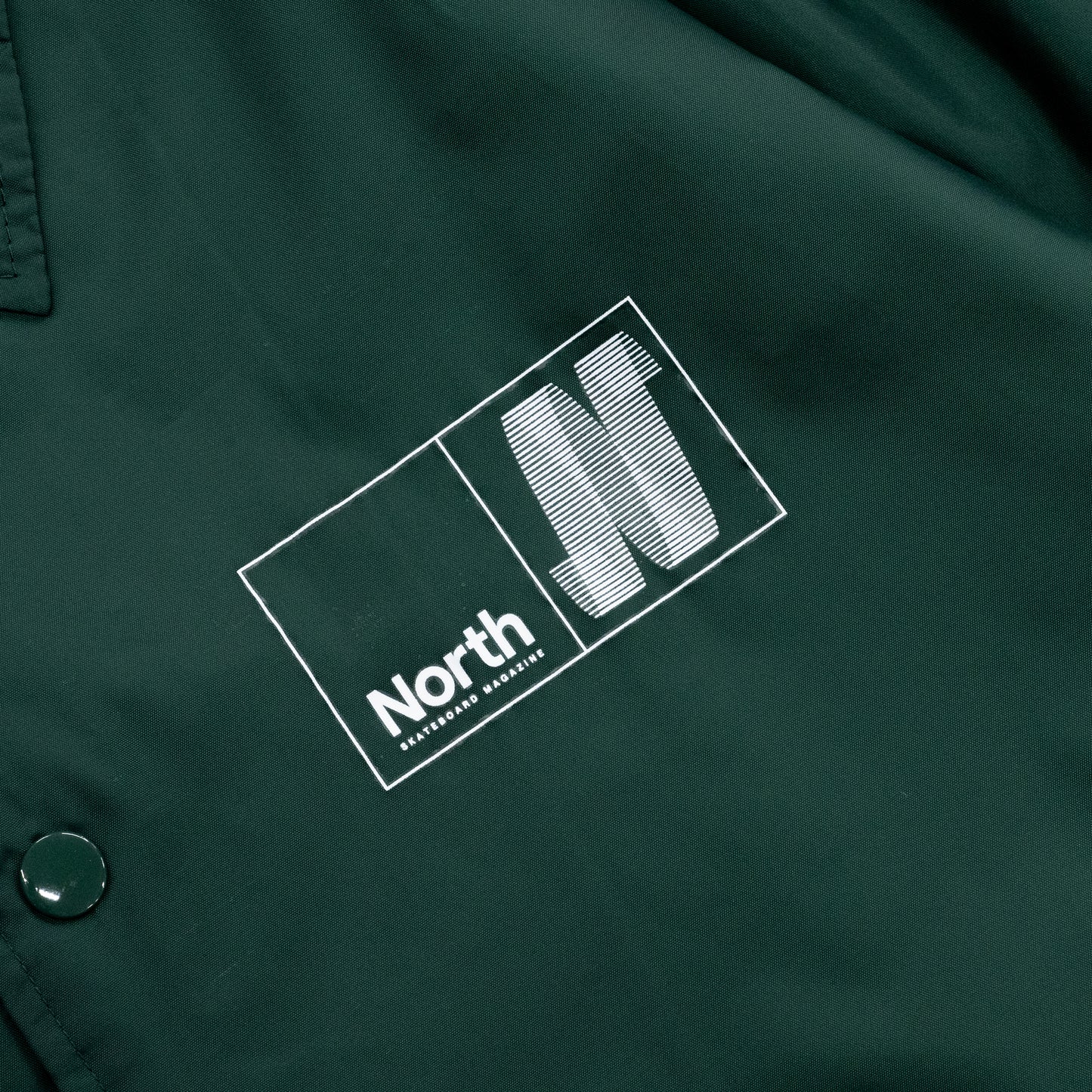 NORTH SKATE MAG N LOGO COACH JACKET - DARK GREEN