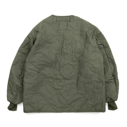 Primeが発掘したDEAD STOCKのVINTAGE「US ARMY AIRCREW NOMEX LINER JACKET / OLIVE DRAB」の背面からの商品写真