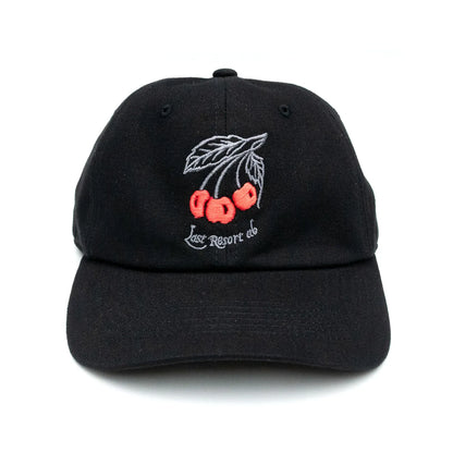 LAST RESORT ABのフロントにチェリーのイラストが刺繍で入るBLACKカラーのコットン製ダッドハットキャップ「CHERRIES DADDY CAP」の正面からの商品写真