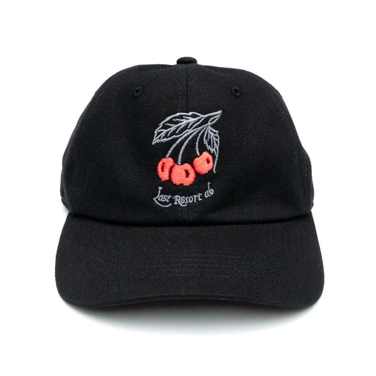 LAST RESORT ABのフロントにチェリーのイラストが刺繍で入るBLACKカラーのコットン製ダッドハットキャップ「CHERRIES DADDY CAP」の正面からの商品写真
