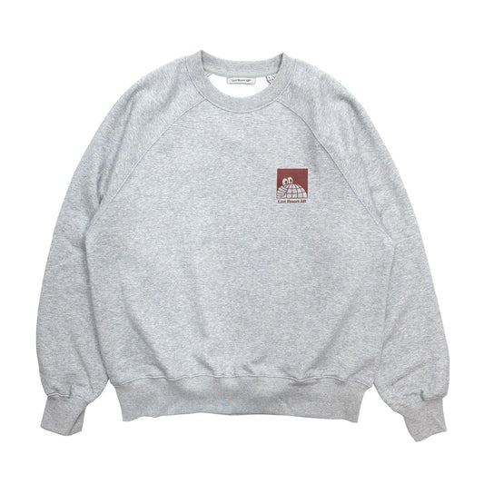 LAST RESORT AB(ラストリゾート)のアトラスロゴが左胸にプリントされたスエット「LITTLE AB RAGLAN CREW SWEAT」の「GREY MELANGED」カラーの正面からの商品写真