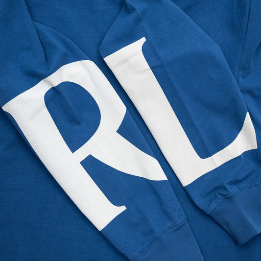 LAST RESORT AB(ラストリゾート)のロングスリーブTシャツ「LR LOGO L/S TEE」のMID BLUEカラーの両腕のデザイン写真