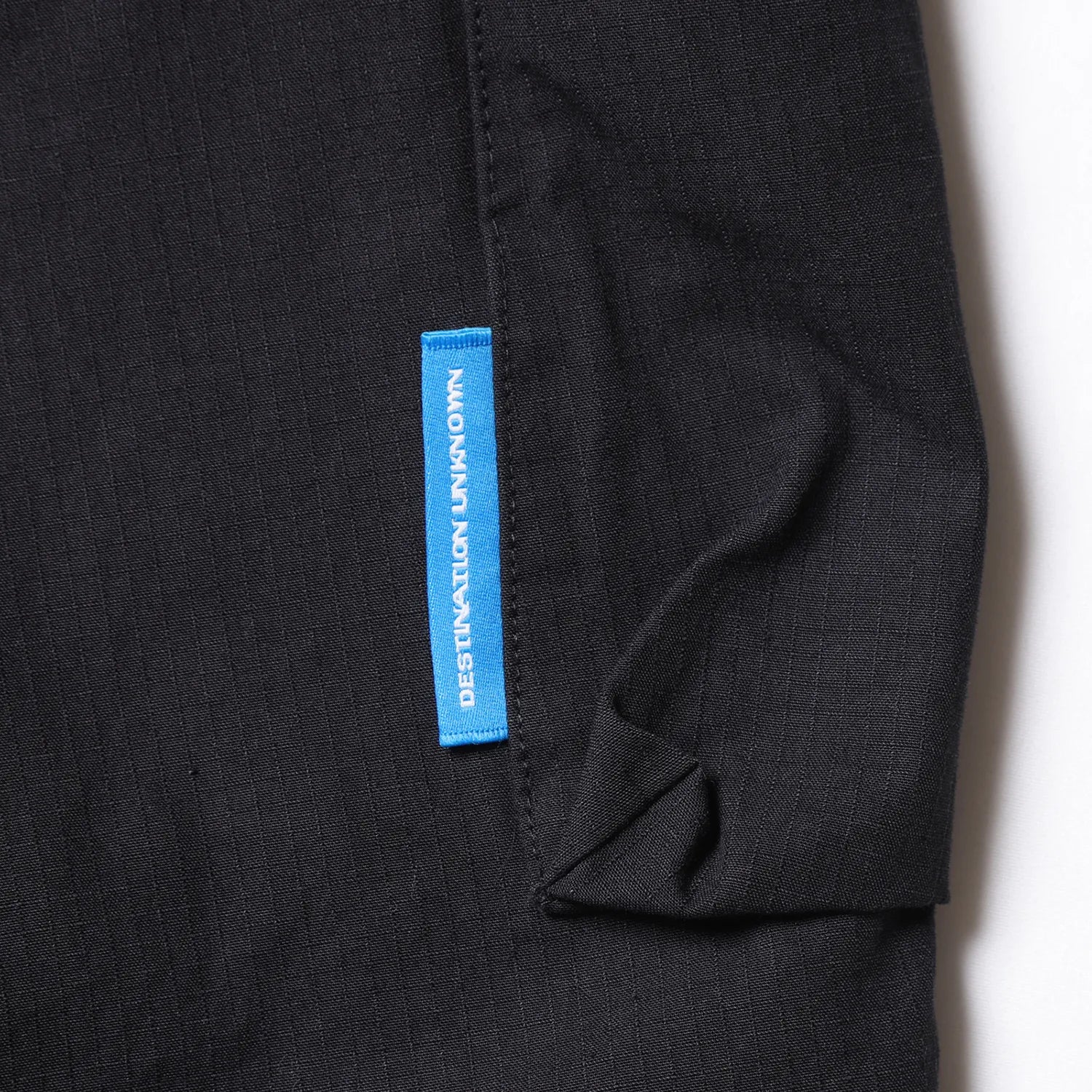 Liberaiders(リベレイダース)の高機能ナイロンショーツ「CORDURA RIP UTILITY SHORTS」のBLACKカラーのピスネームの写真