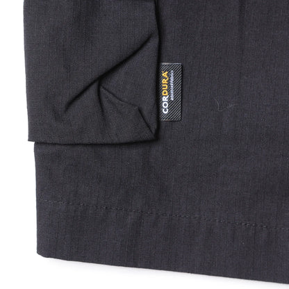 Liberaiders(リベレイダース)の高機能ナイロンショーツ「CORDURA RIP UTILITY SHORTS」のBLACKカラーのコーデュラナイロンを証明する製品タグの写真