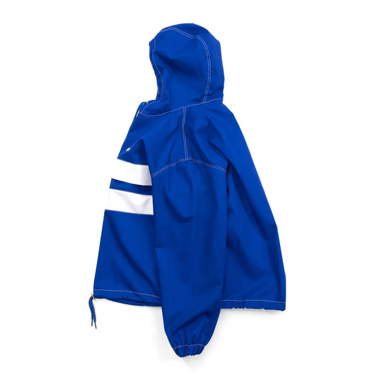 MAGENTA(マジェンタ)から待望の復刻を果たしたスケートの歴史に深く刻まれたTOM PENNYのあの伝説的アノラックジャケット「TOM 96 JACKET」のBLUEカラーの側面からの商品写真