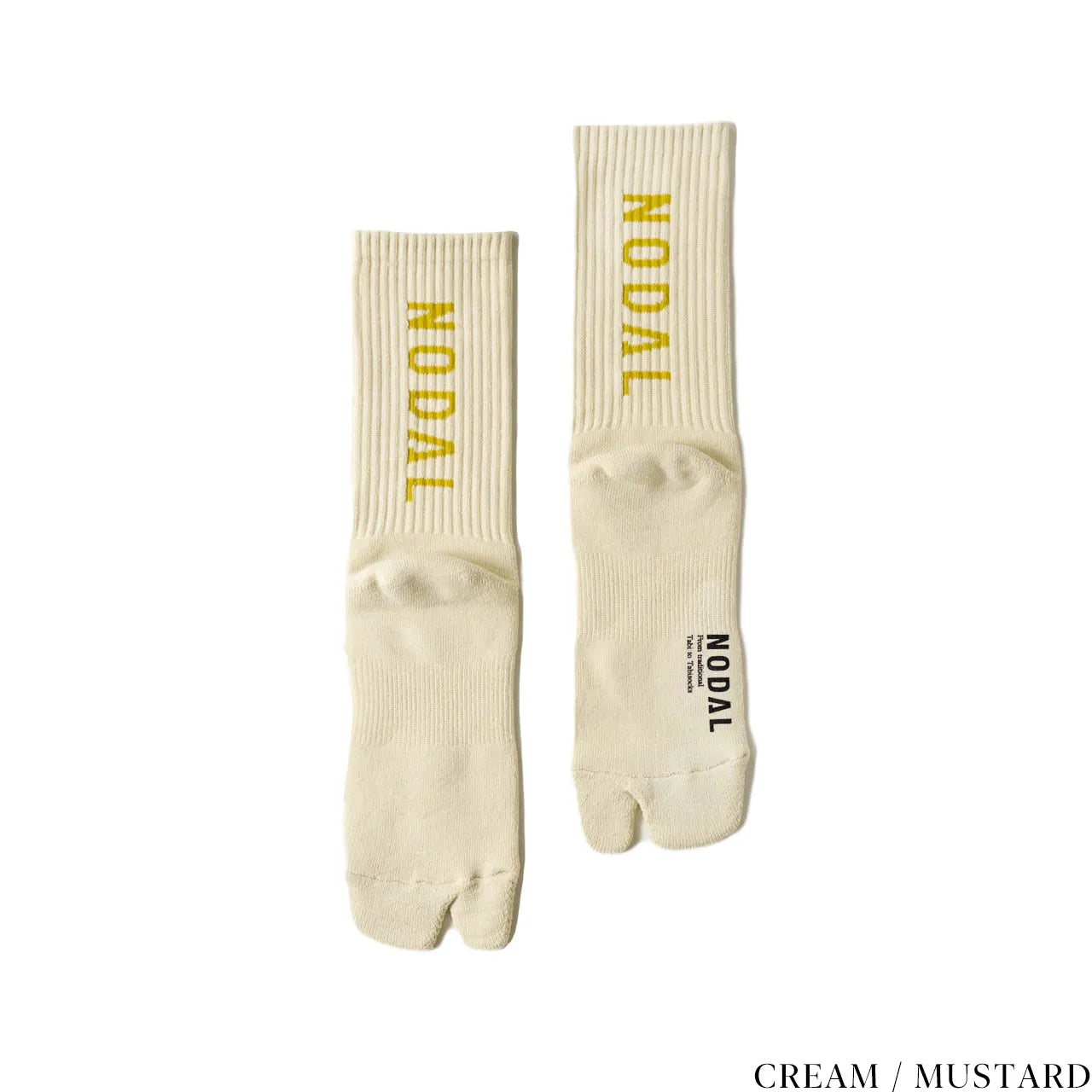 NODAL（ノーダル）ロゴを背面に配し存在感を放つソックス「LOGO SOCKS」のCREAM&MUSTARDカラーの商品写真