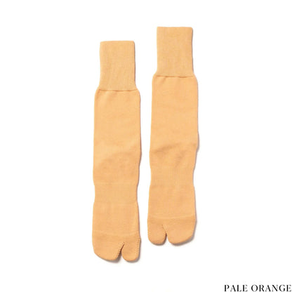 NODAL（ノーダル）を代表する日常に寄り添う高品質ソックス「NEW STANDARD SOCKS」のPALE ORANGEカラーの商品画像