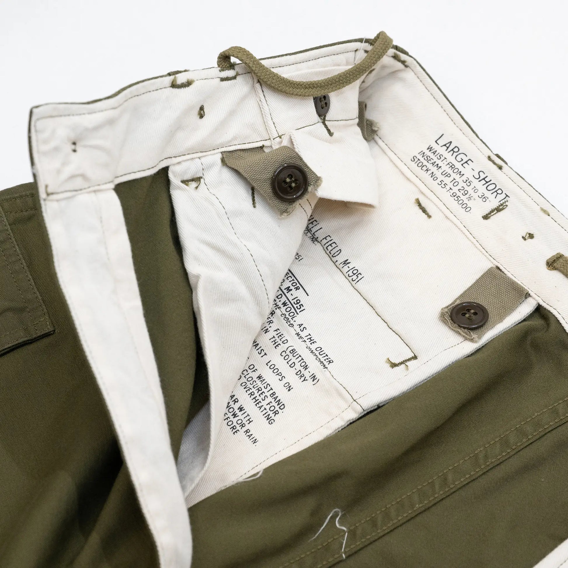 BUZZ RICKSON'Sの名作カーゴパンツ「M-1951 FIELD SHELL TROUSERS SHORT LENGTH - OLIVE DRAB（BR41962）」のウエスト内側の写真