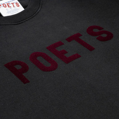 フロントにブランドロゴがフロッキープリントされたPOETS(ポエッツ)のスエット「OG FLOCKED CHAMPION CREW SWEAT」のBLACKカラーの正面のデザイン写真