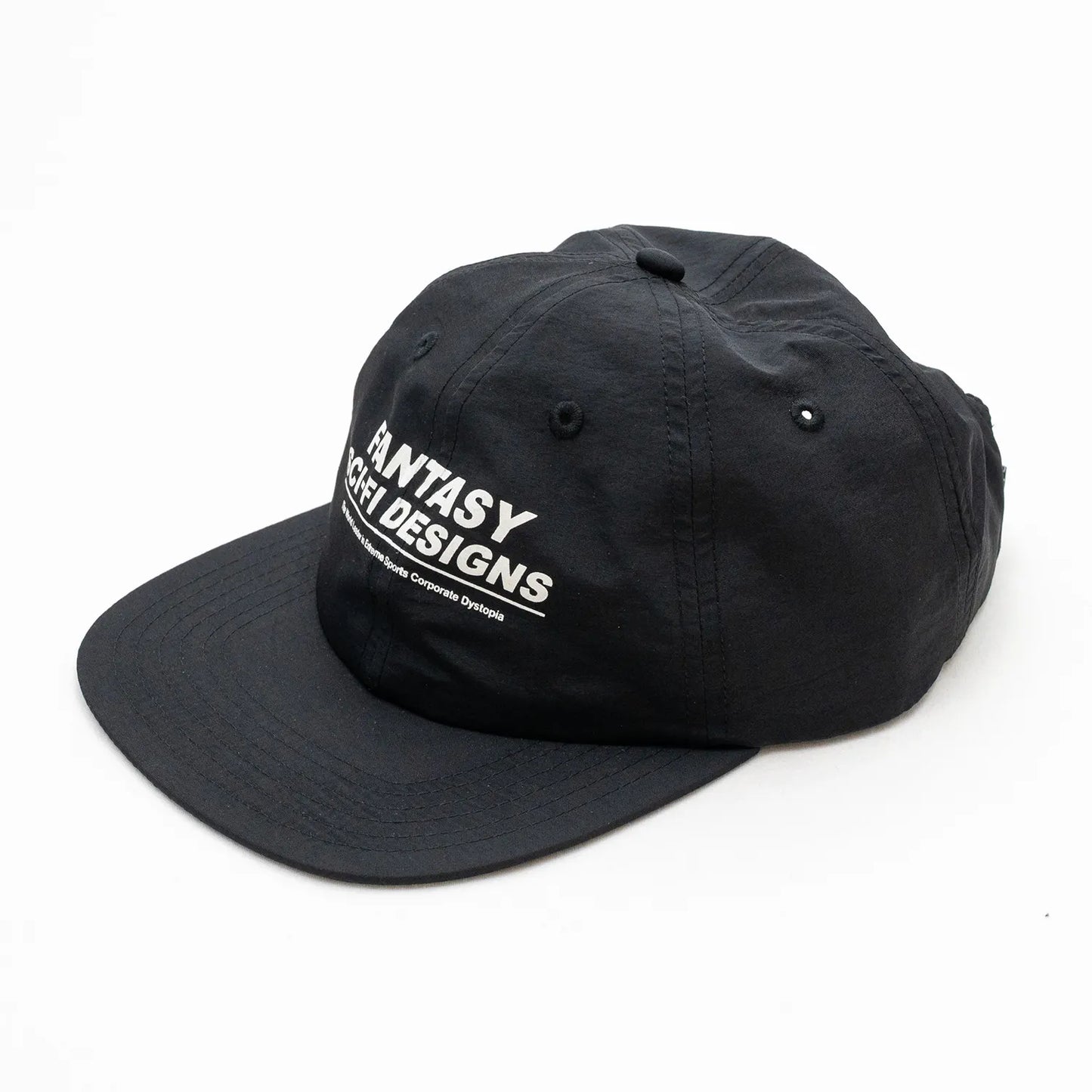 SCI-FI FANTASYのフロントにデザインがプリントされたナイロン製キャップ「EXTREME DESIGN HAT」のBLACKカラーの斜め左手前からの商品写真
