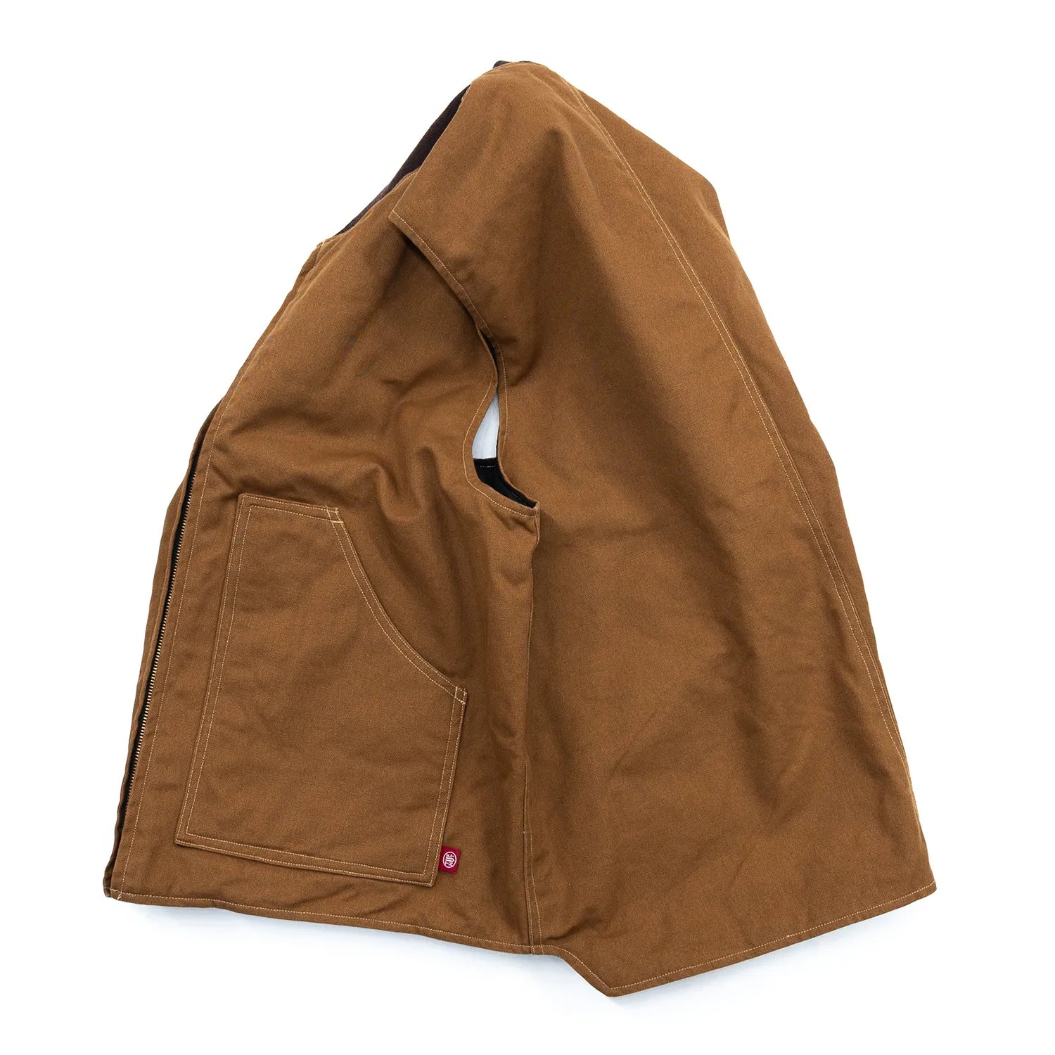 東洋エンタープライズによるTUF-NUT(タフナット)の12.5ozのコットンダック生地を使用した「COTTON DUCK WORK VEST」のCAMELカラーの側面からの商品写真