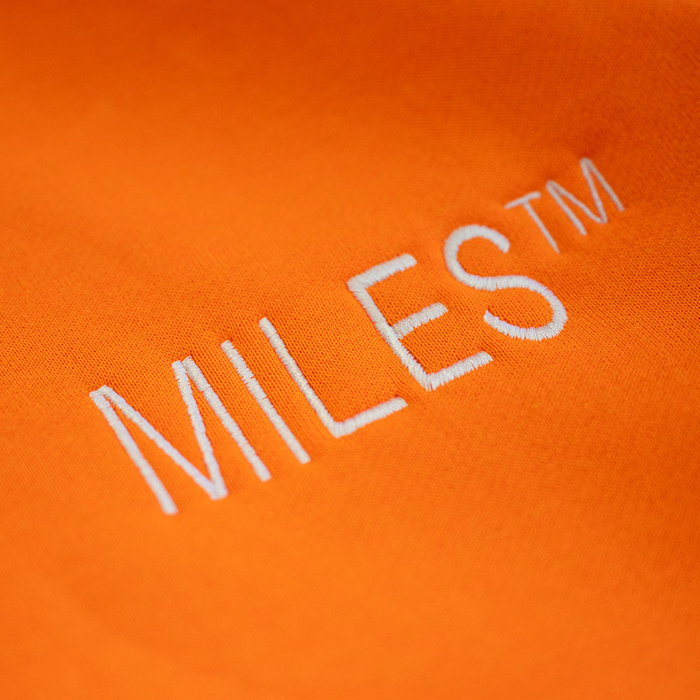 MILES LOGO HIT HOODIE - SAFETY ORANGE